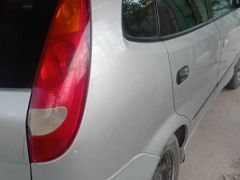 Photo of the vehicle Nissan Almera Tino