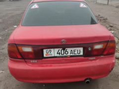 Photo of the vehicle Mazda 323