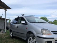 Фото авто Nissan Almera Tino