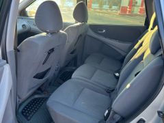 Фото авто Nissan Almera Tino