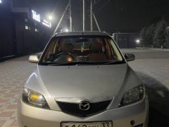 Photo of the vehicle Mazda Demio