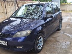 Photo of the vehicle Mazda Demio