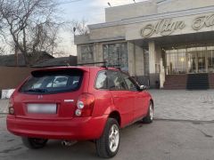 Фото авто Mazda 323