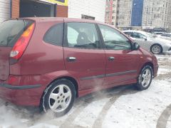 Фото авто Nissan Almera Tino