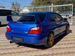 Фото авто Subaru Impreza WRX STi