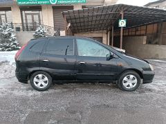 Фото авто Nissan Almera Tino