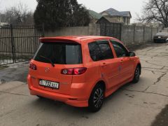 Сүрөт унаа Mazda Demio