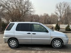 Сүрөт унаа Toyota Raum