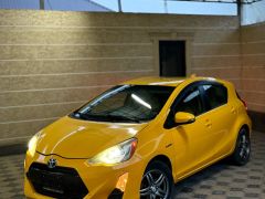 Фото авто Toyota Prius c