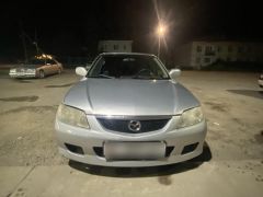 Сүрөт унаа Mazda 323