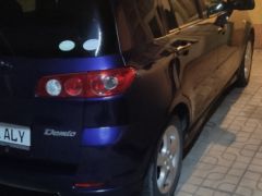 Photo of the vehicle Mazda Demio