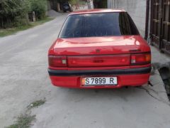 Сүрөт унаа Mazda 323