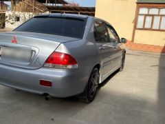 Сүрөт унаа Mitsubishi Lancer