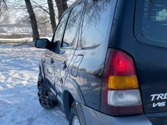 Photo of the vehicle Mazda Tribute