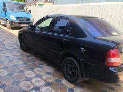 Сүрөт унаа Mazda Protege