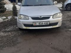 Фото авто Mazda 323