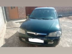 Фото авто Mazda 323