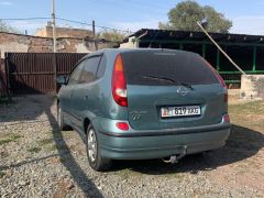 Фото авто Nissan Almera Tino