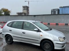 Photo of the vehicle Nissan Almera Tino