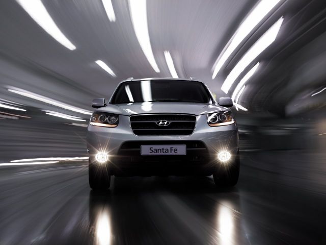 Фото Hyundai Santa Fe II #3