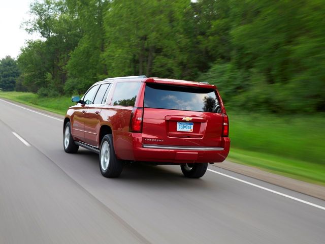 Фото Chevrolet Suburban XI #5