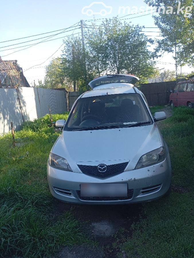 Mazda Demio II (DY)