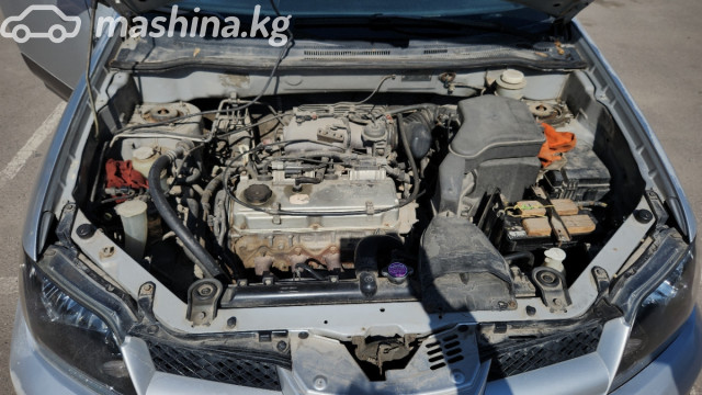Mitsubishi Outlander I 2.4 AT 4WD — фото 10