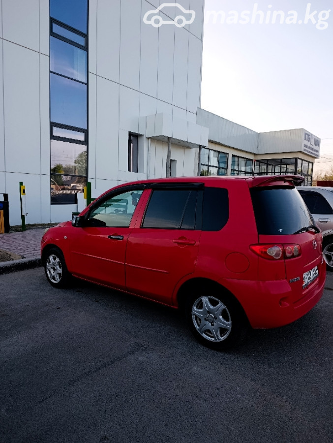 Mazda Demio II (DY)