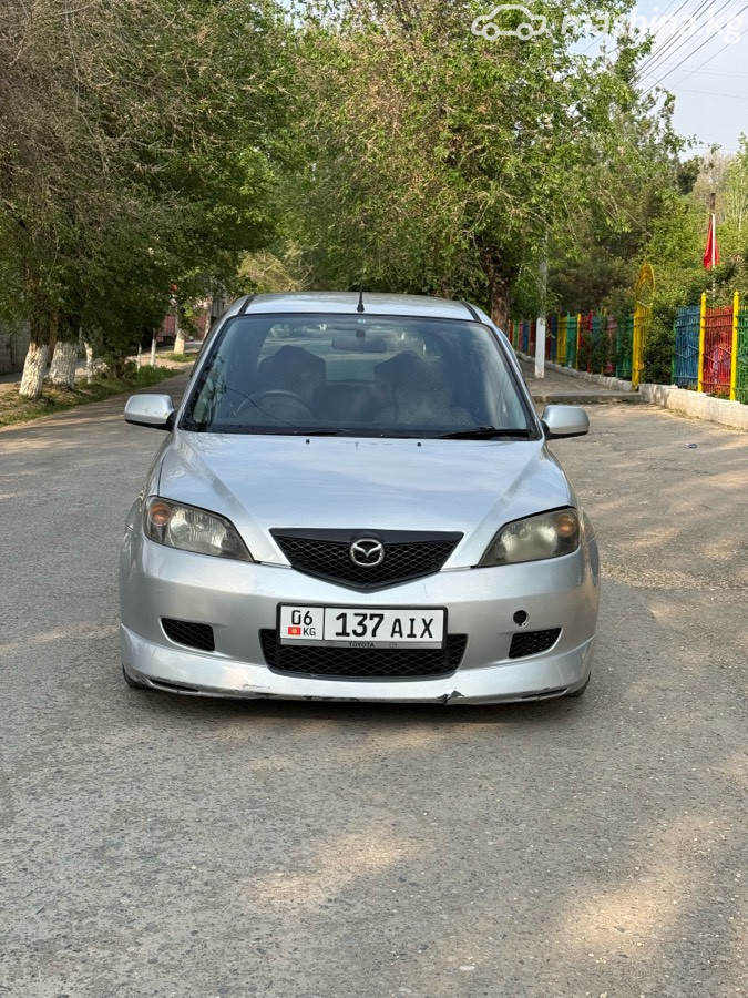 Mazda Demio II (DY)
