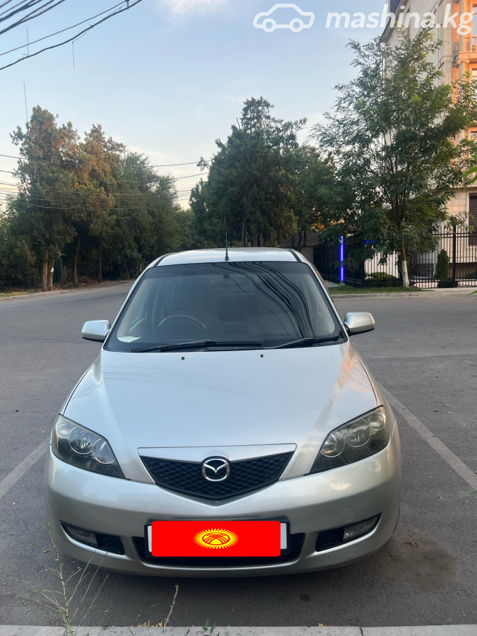 Mazda Demio II (DY)