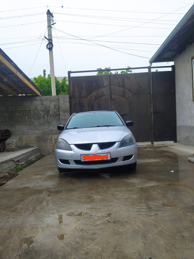 Mitsubishi Lancer IX Рестайлинг