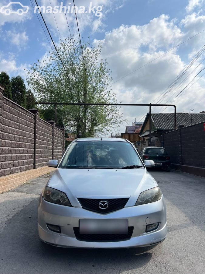 Mazda Demio II (DY)