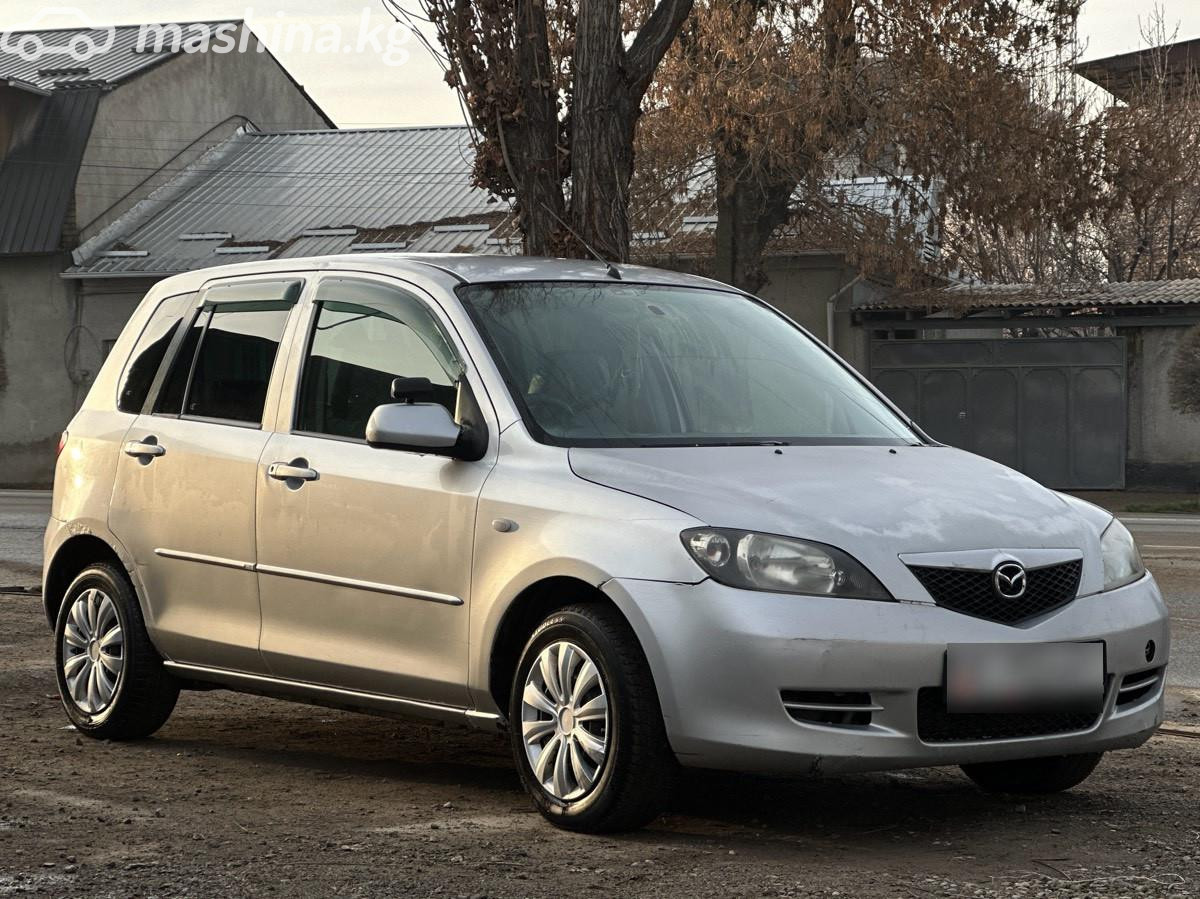 Mazda Demio II (DY)