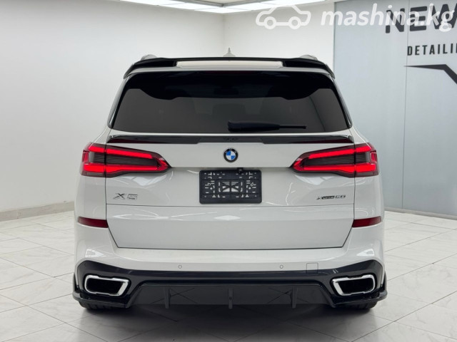 BMW X5 IV (G05/G18) 50i 4.4 AT 4WD — фото 4